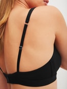 Women model is wearing Soft bra made of Polyamide in Black, Unicoloured from the Sleek Skin series by CALIDA, Detail
