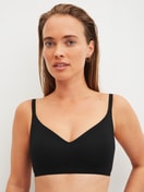 Women model is wearing Bonded Bra made of Modal in Black, Unicoloured from the Natural Skin series by CALIDA, Front view