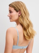 Women model is wearing Soft bra without underwire made of Cotton in Blue, Unicoloured from the Cate series by CALIDA, Back view
