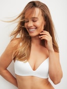 Women model is wearing Padded bra without underwire made of Polyamide in White, Unicoloured from the Sleek Skin series by CALIDA, Additional Image