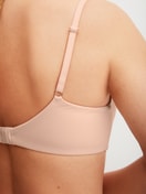 Women model is wearing Padded bra without underwire made of Polyamide in Beige, Unicoloured from the Sleek Skin series by CALIDA, Detail
