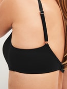 Women model is wearing Padded bra without underwire made of Polyamide in Black, Unicoloured from the Sleek Skin series by CALIDA, Detail