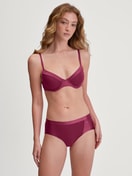 Underwired T-shirt bra Women model is wearing Underwired T-shirt bra made of 100% Cotton in Pink, Unicoloured from the Cate series by CALIDA, Outfit