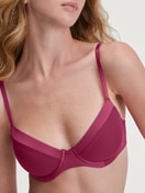 Underwired T-shirt bra Women model is wearing Underwired T-shirt bra made of 100% Cotton in Pink, Unicoloured from the Cate series by CALIDA, Detail