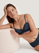 Women model is wearing Underwired T-shirt bra with padding made of Viscose in Blue, Lace from the Sensual Secrets series by CALIDA, Additional Image