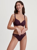 Women model is wearing Spacer bra with wires made of Polyamide in Red, Lace from the Sensual Secrets series by CALIDA, Outfit