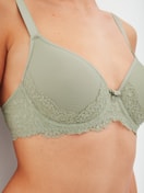 Women model is wearing Spacer bra with wires made of Polyamide in Green, Lace from the Sensual Secrets series by CALIDA, Detail
