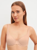 Women model is wearing underwired bra made of Polyamide in Beige, Unicoloured from the Sleek Skin series by CALIDA, Front view