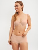 Women model is wearing underwired bra made of Polyamide in Beige, Unicoloured from the Sleek Skin series by CALIDA, Outfit