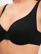 Women model is wearing underwired bra made of Polyamide in Black, Unicoloured from the Sleek Skin series by CALIDA, Detail