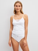 Women model is wearing Spaghetti top made of 100% Cotton in White, Lace from the Cotton Desire series by CALIDA, Outfit