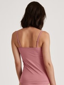 Women model is wearing Spaghetti top made of Cotton in Pink, Lace from the Nat. Comfort Xtra series by CALIDA, Back view