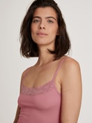 Women model is wearing Spaghetti top made of Cotton in Pink, Lace from the Nat. Comfort Xtra series by CALIDA, Detail