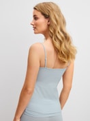 Women model is wearing Spaghetti top made of Cotton in Blue, Unicoloured from the Cate series by CALIDA, Back view