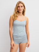 Women model is wearing Spaghetti top made of Cotton in Blue, Unicoloured from the Cate series by CALIDA, Outfit