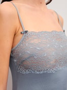 Women model is wearing Spaghetti strap top with lace made of Lace in Grey, Lace from the Sensual Secrets series by CALIDA, Detail