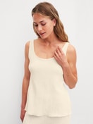 Women model is wearing Tank top made of Cotton in Beige, Unicoloured from the Favourites Layering series by CALIDA, Front view