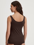 Women model is wearing Tank top made of Modal in Brown, Unicoloured from the Soft Favourites series by CALIDA, Back view