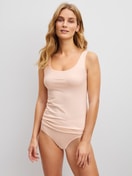 Women model is wearing Tank top made of Cotton in Pink, Unicoloured from the Natural Comfort series by CALIDA, Outfit