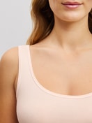 Women model is wearing Tank top made of Cotton in Pink, Unicoloured from the Natural Comfort series by CALIDA, Detail