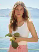 Women model is wearing Tank top made of Cotton in White, Unicoloured from the Favourites Beach series by CALIDA, Front view