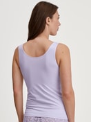 Women model is wearing Tank top made of Cotton in Purple, Lace from the Natural Comfort Lace series by CALIDA, Back view