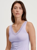 Women model is wearing Tank top made of Cotton in Purple, Lace from the Natural Comfort Lace series by CALIDA, Front view