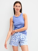 Women model is wearing Tank top made of Cotton in Blue, Unicoloured from the Favourites Ocean series by CALIDA, Outfit