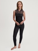 Women model is wearing Tank top made from wool and silk made of Lace in Black, Lace from the Silky Wool Glam series by CALIDA, Outfit