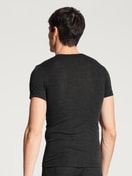 Men model is wearing T-shirt made of Wool in Blue, Unicoloured from the Wool & Silk series by CALIDA, Back view