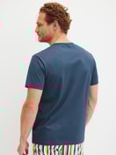 Men model is wearing Short-sleeved shirt made of 100% Cotton in Blue, Unicoloured from the RMX Sleep Holiday series by CALIDA, Back view