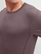 Men model is wearing Shirt short sleeve made of Modal in Brown, Unicoloured from the DSW Balancing series by CALIDA, Detail