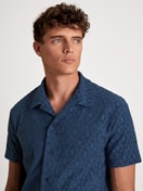 Short shirt with button facing