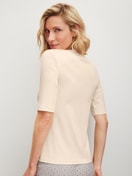 Women model is wearing Shirt short sleeve made of Cotton in Beige, Unicoloured from the Favourites Arts series by CALIDA, Back view