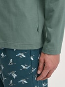 Men model is wearing Shirt long sleeve made of 100% Cotton in Green, Unicoloured from the RMX Sleep Weekend series by CALIDA, Detail