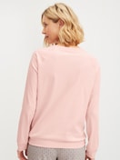 Le mannequin Femme porte le/la T-shirt à manches longues et raglan en 100% coton de couleur Rose, Unicolore, de la série Favourites Arts de CALIDA, Vue arrière