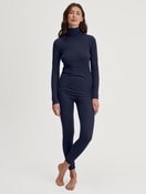 Women model is wearing Long-sleeve turtleneck shirt in wool-silk made of Wool in Blue, Unicoloured from the True Confidence series by CALIDA, Outfit