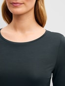 Women model is wearing Shirt long sleeve made of Modal in Black, Unicoloured from the Sleep Over M&M series by CALIDA, Detail