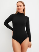 Women model is wearing Shapewear longsleeve Body made of Polyamide in Black, Unicoloured from the Seamless Shape series by CALIDA, Front View
