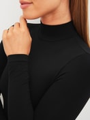 Women model is wearing Shapewear longsleeve Body made of Polyamide in Black, Unicoloured from the Seamless Shape series by CALIDA, Detail