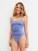 Women model is wearing Low Cut Tanga Brief made of Polyamide in Blue, Unicoloured from the Sleek Skin series by CALIDA, Additional Image