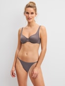 Women model is wearing Low Cut Tanga Brief made of Polyamide in Brown, Unicoloured from the Sleek Skin series by CALIDA, Outfit