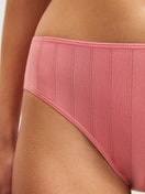 Women model is wearing Brief, regular cut made of Cotton in Pink, Lace from the Etude Xtra series by CALIDA, Detail
