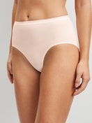 Women model is wearing Brief made of Cotton in Pink, Unicoloured from the Natural Comfort series by CALIDA, Front view