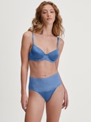 Women model is wearing High-waisted briefs with lace waistband made of Lace in Blue, Lace from the Sensual Secrets series by CALIDA, Outfit