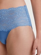 Women model is wearing High-waisted briefs with lace waistband made of Lace in Blue, Lace from the Sensual Secrets series by CALIDA, Detail