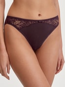 Women model is wearing Brief, regular cut made of Lace in Red, Lace from the Sensual Secrets series by CALIDA, Front view