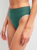 Women model is wearing Brief, high waist made of Cotton in Green, Unicoloured from the Elastic series by CALIDA, Front view