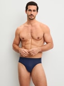 Men model is wearing Brief made of Lyocell in Blue, Unicoloured from the Natural Cooling series by CALIDA, Outfit