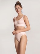 Women model is wearing High Waist Briefs, 2-Pack made of Cotton in Pink, Unicoloured from the Elastic Duopack series by CALIDA, Outfit